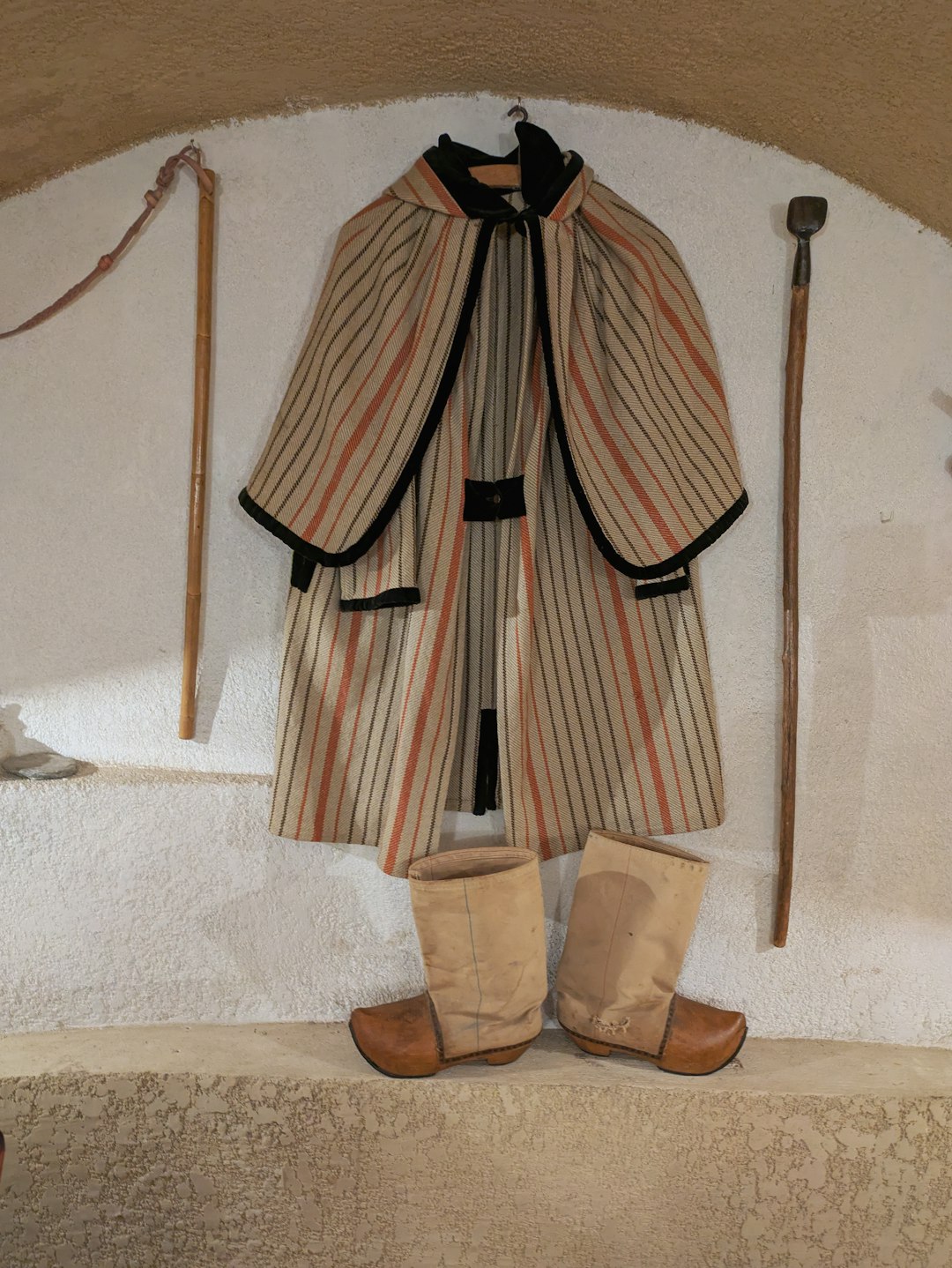 Traditional and contemporary clothing display, photo by Snap Wander on Unsplash